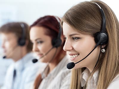 A customer service representative wearing a headset